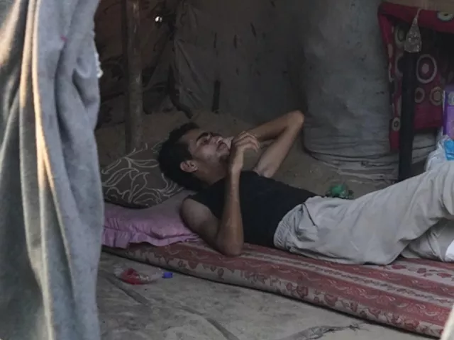 21 year old palestinian man fathi abdulal rests in a tent after being released from an israeli prison after 7 months in deir al balah gaza on july 27 2024 photo anadolu agency 21 year old palestinian man fathi abdulal rests in a tent after being released from an israeli prison after 7 months in deir al balah gaza on july 27 2024 photo anadolu agency
